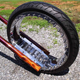 Illustration for article titled Hubless Monster Motorcycle Rolls Without Spokes